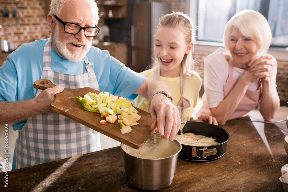 Grandparents cooking with grandkids